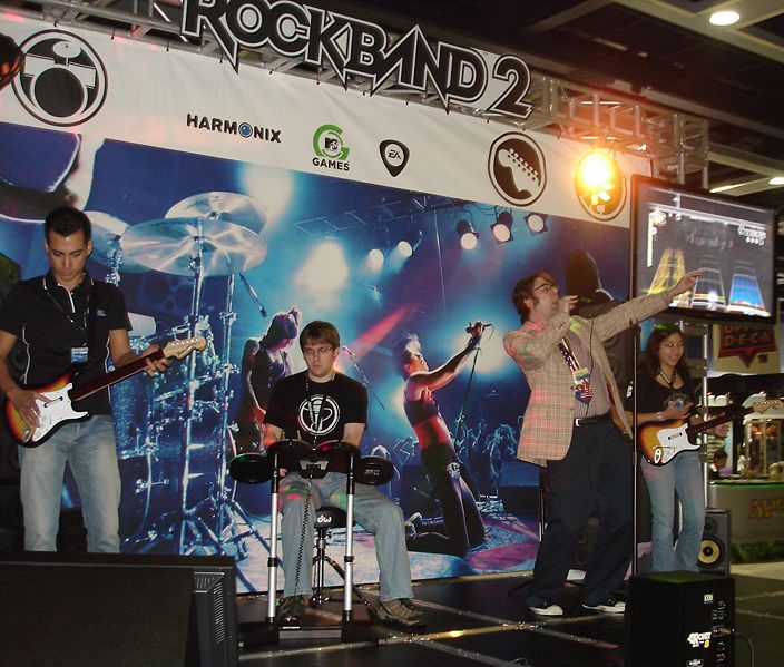 Four people play on the Rock Band 2 stage at the Penny Arcade Expo in Seattle, Washington, August 29, 2008.